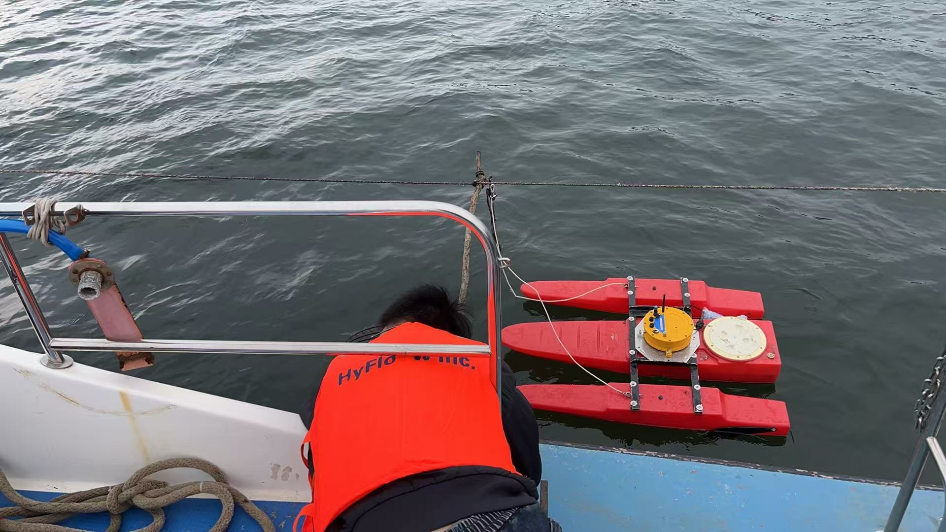Deploying the Voyager DF9 on a catamaran float from a survey vessel